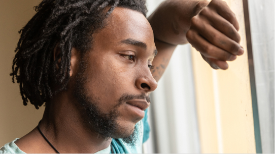 An African American man struggles with stigma